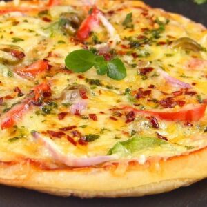 10 minutes Pizza Paratha without Oven / Pan pizza with Frozen Paratha recipe by Tiffin Box