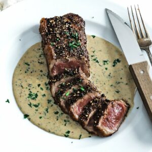 Steak Au Poivre Recipe – Peppered Steak with Cognac Cream Sauce