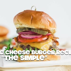 Classic Cheeseburger Recipe on Brioche with Lettuce Tomato and Onions